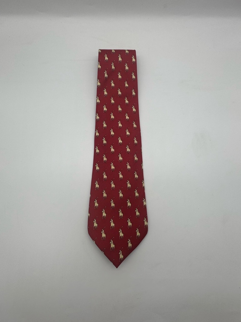 Polo Ralph Lauren silk necktie featuring the iconic pony motif.